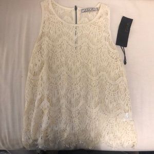 Cream, sleeveless top